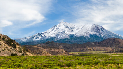 Northwest flank view of Mount Shasta volcano in Northern California with Shastina peak
