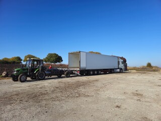 A tractor pulling a trailer