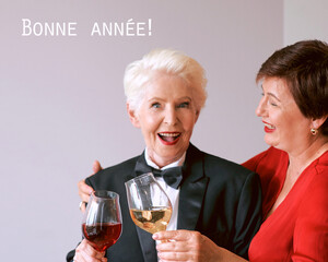 Two beautiful stylish mature senior women celebrating new year. Fun, party, style, celebration concept