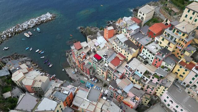 Europe, Italy, Liguria, Cinque Terre - Drone aerial view of Riomaggiore - The Cinque Terre are an increasingly popular tourist attraction for tourists from all over the world Unesco Heritage 