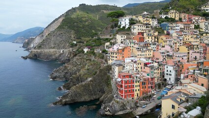 Fototapeta na wymiar Europe, Italy, Liguria, Cinque Terre - Drone aerial view of Riomaggiore - The Cinque Terre are an increasingly popular tourist attraction for tourists from all over the world Unesco Heritage 