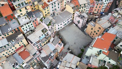 Europe, Italy, Liguria, Cinque Terre - Drone aerial view of Riomaggiore - The Cinque Terre are an...