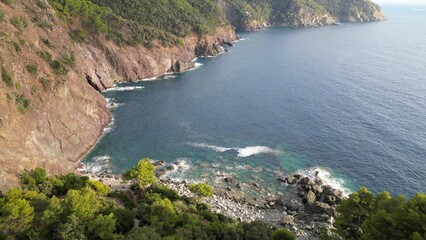 Europe, Italy, Liguria , Framura - drone aerial view of amazing sea landscape in Tigullio national park with pine forest and cliff between Framura Bonassola and Levanto pedestrian path - Cinque Terre 