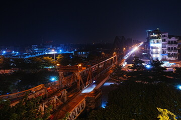 Fototapeta na wymiar Long Bien Bridge at Night, in Hanoi, Vietnam - ベトナム ハノイ 夜景 ロンビエン橋