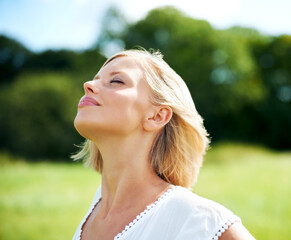 Woman, breathe and calm in nature, peace and zen for inner wellness, summer and relax. Person,...