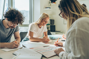 A diverse group of young individuals gathers at the language school, embarking on a journey to...
