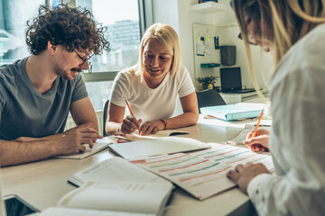 A diverse group of young individuals gathers at the language school, embarking on a journey to explore new languages and cultures through shared knowledge and experiences.