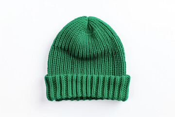 Green knitted warm winter hat isolated on white background