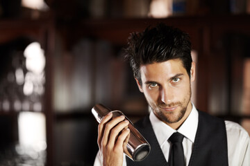 Shake, cocktail and portrait of bartender with a drink for customer in dark club or night. Mixing, alcohol and face of barman with liquor in metal container or shaker for a strong beverage in a bar