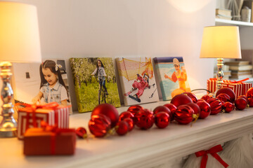 Canvas with printed photo on white wall in living room