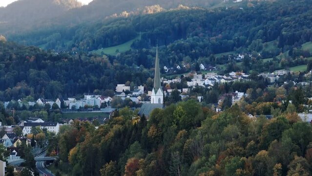 sunset time zurich adliswil town hill side church spire aerial panorama 4k switzerland