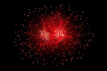 Fireworks in the night sky. Fireworks flashes on a dark background.