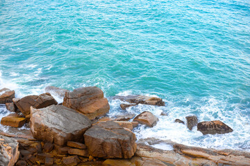 Fototapeta na wymiar Seascape. Sea waves wash the rocky shore.