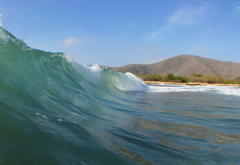 a wave on a beach on the coast of Venezuela