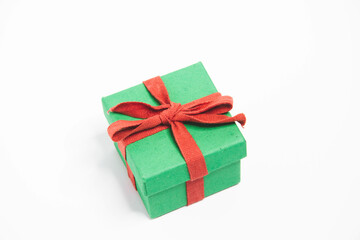 Present. Gift box with a bow. New Year's surprise. Red and green box with a gift