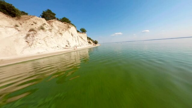 FPV, Ukraine, View from the mountain Pivikha on the Kremenchuk water reservoir near Svitlovodsk, Kirovograd region, Ukraine. Natural background in a sunny summer day.
