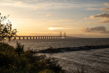 Fototapeta na wymiar Øresund bridge at sunset with gale storm blowing