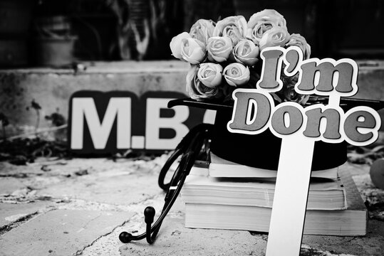 NEW graduation photo  medical field  doctor to be  stethoscope  graduation hat , iam done  graduation flowers pink flower graduation cap  phot session girly photo , M.B.CH.B , medical books , i did it