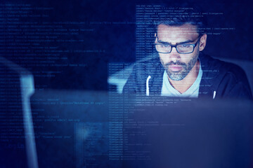 Hacker, code and overlay with man and computer for scam, cyber security and password theft. Phishing, technology and night with person and online crime for crypto, malware and finance fraud software