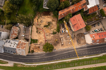 Drone photography of high rise building construction site in the middle of city