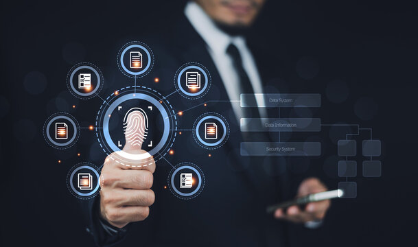 Businessman scan fingerprint login to document data system.