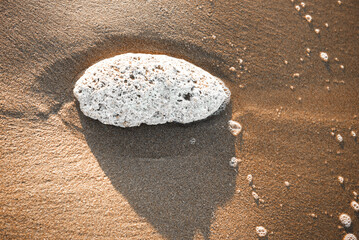 Fototapeta na wymiar High angle view of stone on beach.