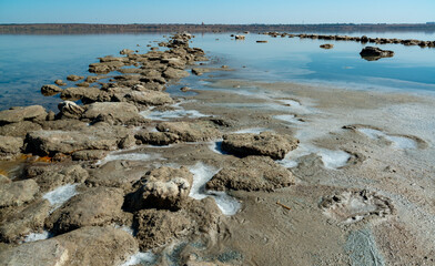 Dead Sea - Kuyalnik estuary, precipitation of self-precipitating salt on the rocks