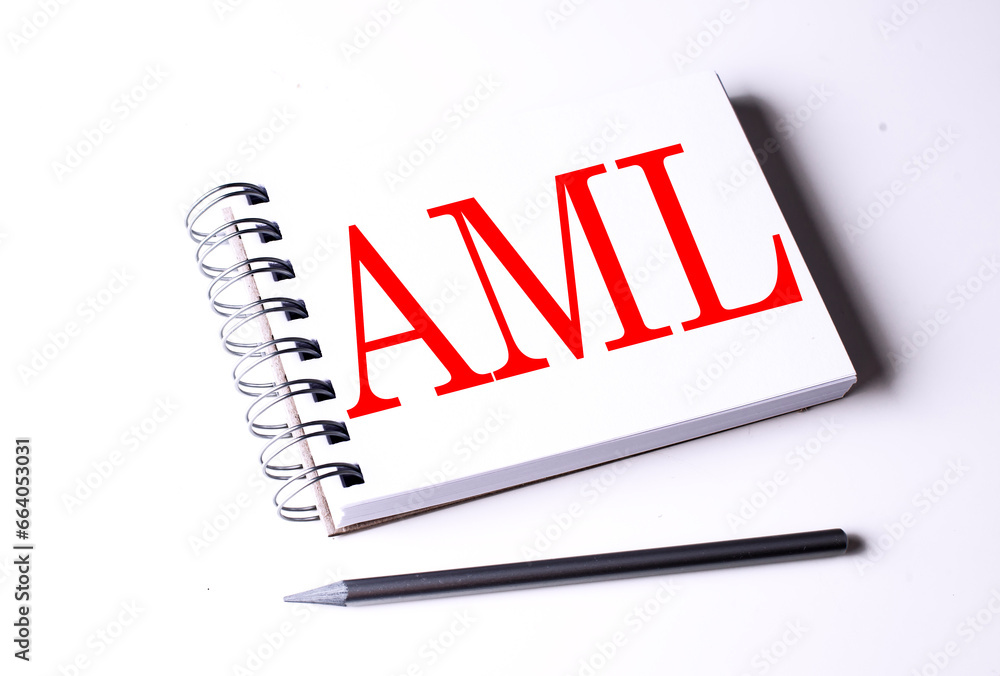 Poster text aml on notebook on the white background