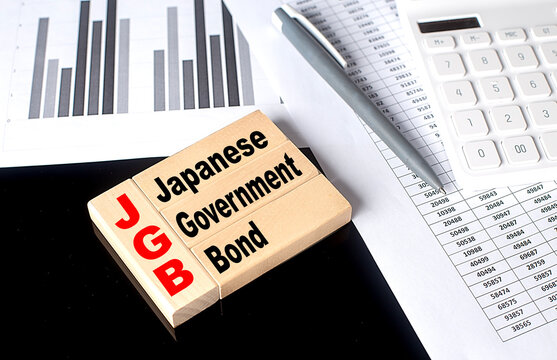 Word JGB made with wood building blocks, business concept