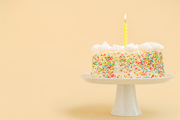 Stand with yummy Birthday cake on beige background