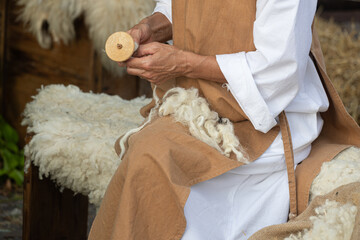 Crafting Heritage: A Close-Up Glimpse of Skilled Artisans Weaving Woolen Wonders on a Classic Loom