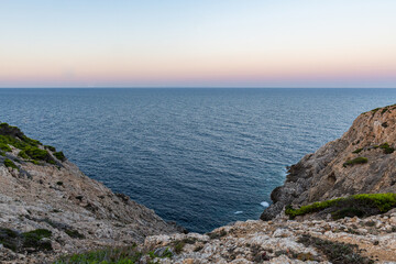 The beautiful coast with the turquoise water of the Mediterranean Sea and stunning cliffs of Cala Ratjada on Majorca Island, Spain