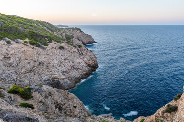 The beautiful coast with the turquoise water of the Mediterranean Sea and stunning cliffs of Cala Ratjada on Majorca Island, Spain