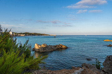 The beautiful coast with the turquoise water of the Mediterranean Sea and stunning cliffs of Cala Ratjada on Majorca Island, Spain
