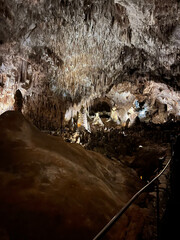 Stalactites and Stalagmite and other rock formations inside the Big Room in Carlsbad Cavern New...