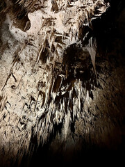 Stalactites and Stalagmite and other rock formations inside the Big Room in Carlsbad Cavern New...