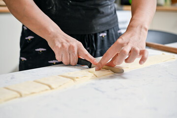 Chef preparing dough for baking     