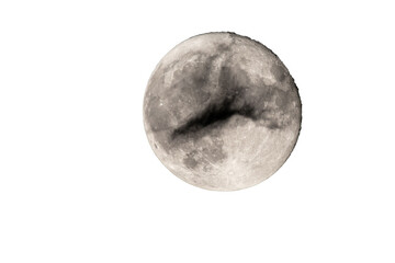Moon photographed with a telescope, where you can see the craters and the lunar surface, it will soon be a moon landing site. Some clouds are in front of the moon.