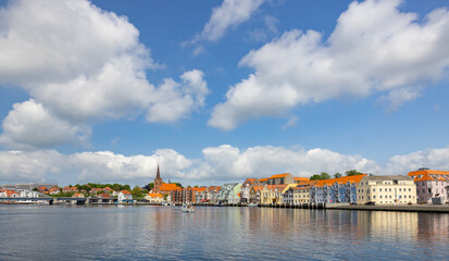 Walking in sønderborg's streets, sønderborg (german: sonderburg, southern jutland: synneborre) is a danish city located on both sides of als sund,