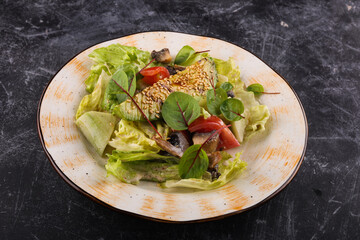 Eggplant, mushroom, tomato and lettuce salad