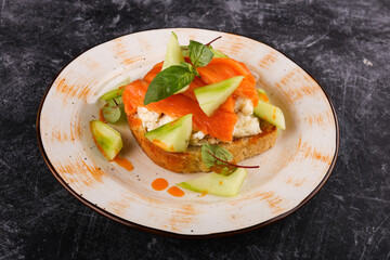 healthy sandwiches with smoked salmon avocado cucumber cream cheese on rye bread