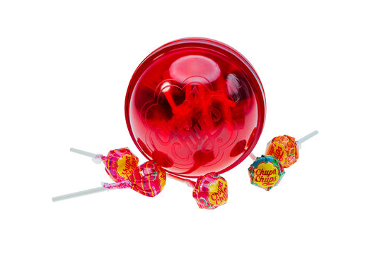 View of big plastic chupa chups package several caramels isolated on white background. Sweden. 