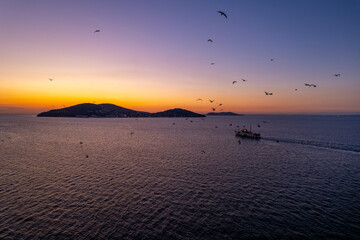 Aerial view of Prince Islands in Istanbul at sunset. Istanbul, Turkey. Ferry goes to the island at sunset. Drone shot.