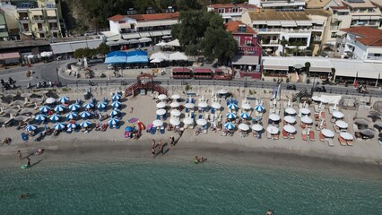 Aerial drone view parga greece, beach crowded with tourists in vacation on summer in famous greek...
