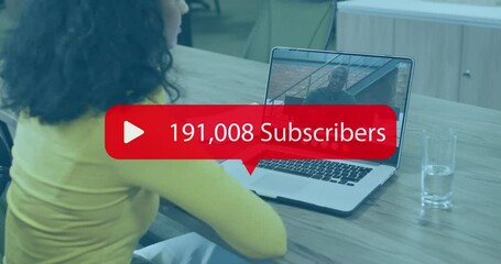 Animation of numbers and subscribers text over biracial businesswoman on laptop video call - Powered by Adobe
