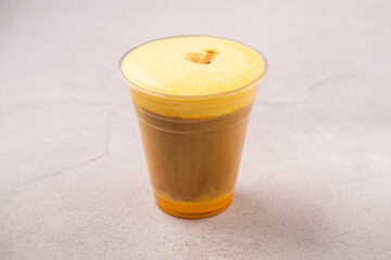 Ice Tea on to go package. Isolated on gray background.