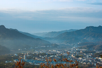 Wuyishan, Wuyishan City, Fujian Province - Aerial view of cityscape and mountains