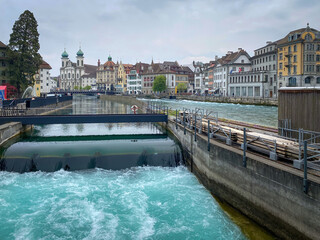 Cityscape of Lucerne, Switzerland with Reuss river and dam