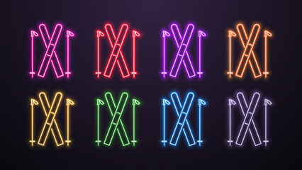 A set of neon ski icons with poles in the colors blue, pink, yellow, red, orange, red and white on a dark background. - obrazy, fototapety, plakaty