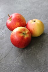dark background with juicy red-yellow apples. Nature abstract background. ripe apples, beautiful background texture, vitamins